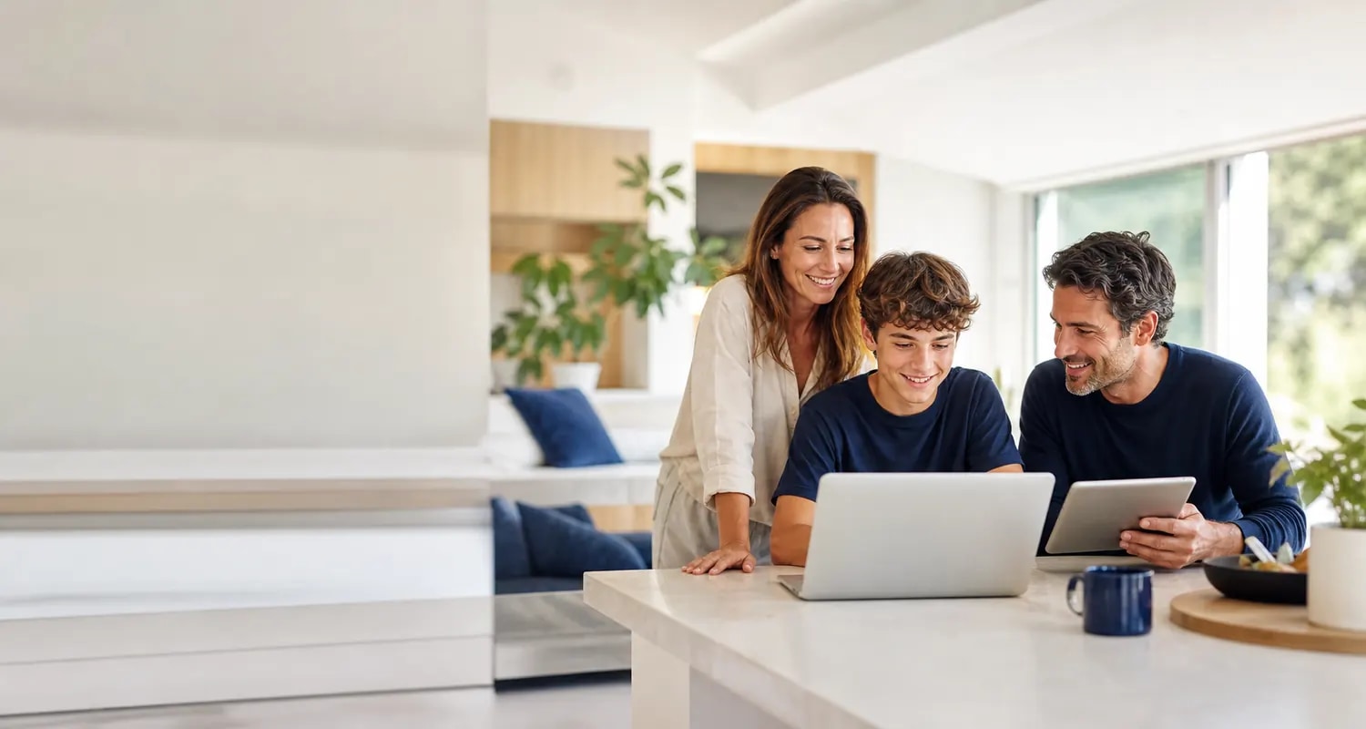 Family using a laptop at home